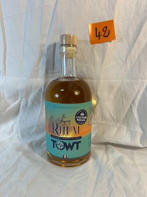 a bottle of rum that is sitting on a table