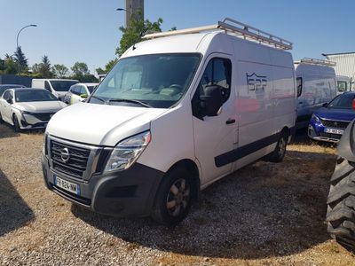 a white van that is parked in a parking lot