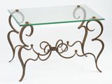 a glass table with a metal frame and a glass top