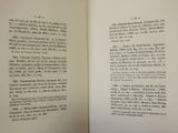 an open book with a picture of a cat on it