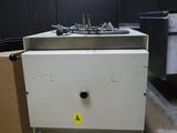 an image of a kitchen with a sink and a box