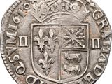 an old silver coin with a coat of arms on it