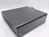 the computer is sitting on a white surface with a white background