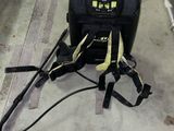 an image of a backpack with a harness attached to it