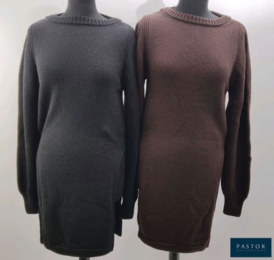 two dresses on a mannequin stand in front of a white background