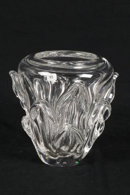 a close up of a glass vase on a black background