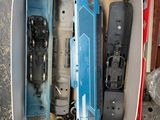 a box with a bunch of toy trains in it