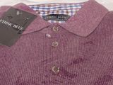 the shirt is purple and has a checkered collar on it