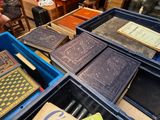 a lot of books that are sitting on a table