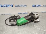 a green and black electric polisher sitting on top of a table