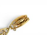 an image of a close up of a gold broochle