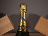 a bottle of champagne that is sitting on a table