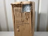 a cardboard box with a hole in it sitting on a table