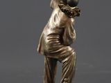 an image of a statue of a man holding a baseball bat