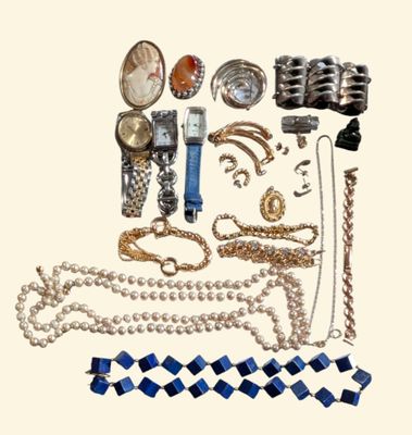 a picture of a bunch of jewelry on a white background