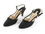 a pair of black shoes with a bow on the heel