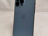 the back of an iphone 11 with a camera on top of it