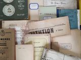 a lot of old books on the table