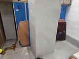 an image of a room that has a refrigerator in it