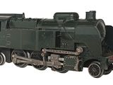 a green train on the tracks on a white background