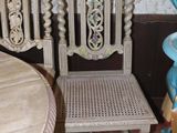 two chairs sitting next to each other in a room