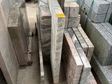 many pieces of granite stacked on top of each other