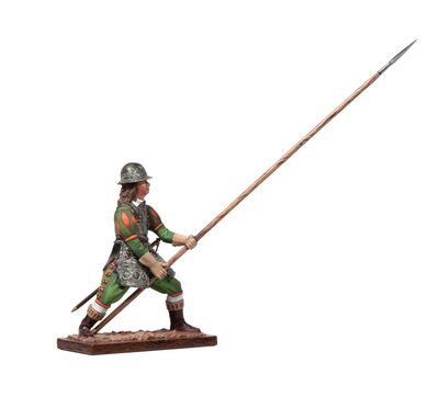 a figurine of a man in armor holding a spear