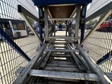 a ladder that is going up the side of a building