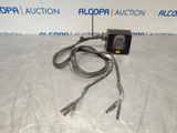 a close up of an electrical device on a table