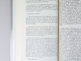 an open book that is sitting on a table