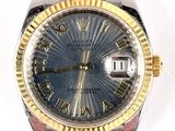 an image of a wrist watch with roman numerals on the face