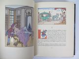 an open book with a picture of a horse drawn carriage