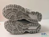 a close up of a pair of running shoes on a table