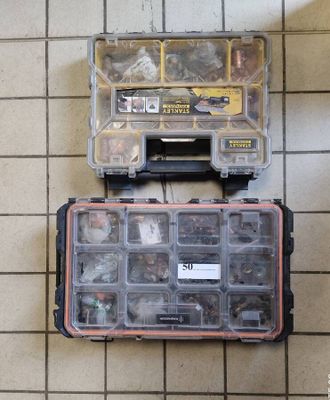 two tools in the case on the floor next to each other