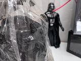 a plastic bag with a darth vader figure in it