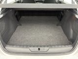 the back of a car with the trunk open and the seats folded down