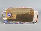 a box with a toy truck in it on a table