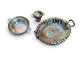 a small bowl and a small bowl on a white surface