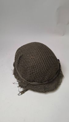 a hat that is sitting on a white surface
