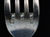 a fork that has some writing on it