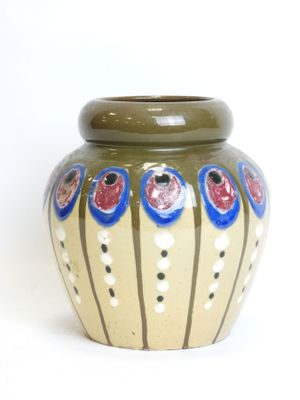 a vase with a design on it on a white background