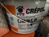 a bucket of crepol sitting on top of an orange bucket