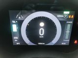 the dashboard of a car with a digital display showing the speed of the car