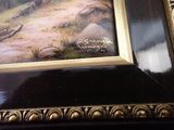 a picture of a picture of a bear that is in a picture frame