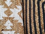 two pillows made out of jute and rope with a black and white pattern