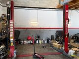 an image of a garage with a lot of tools in it