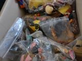 a box full of toys and other items in it