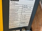 a close up of a machine that is sitting on top of a table