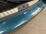 a close up of a car trunk with luggage in it