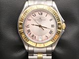 Montre Rolex pour femme avec lunette bicolore en or et chiffres romains